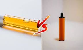 A comparison between a sleek 510 thread battery with a cartridge and a modern disposable THC vape pen.